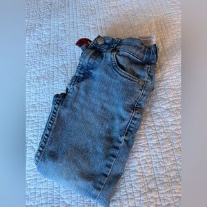 Levi jeans with patched up knee